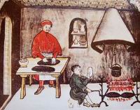 Cuisinier et marmiton devant la cheminee